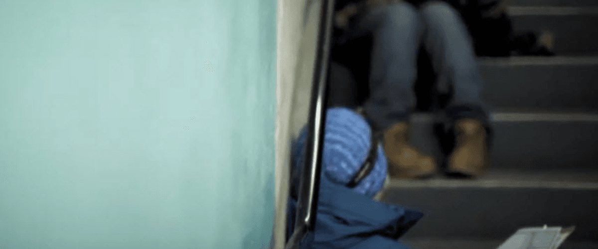 Homeless People on Stairs