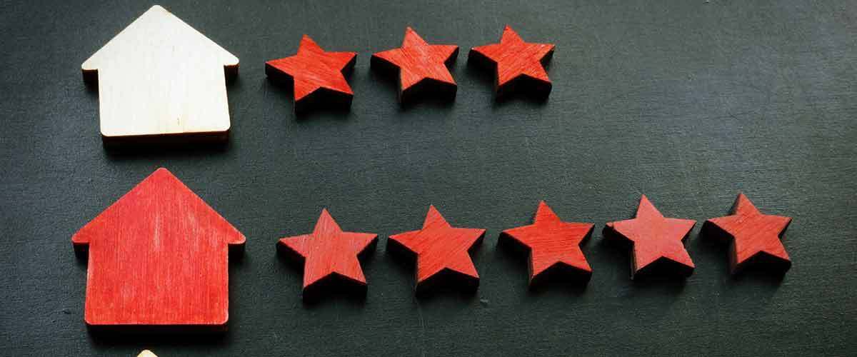 Red stars and two houses